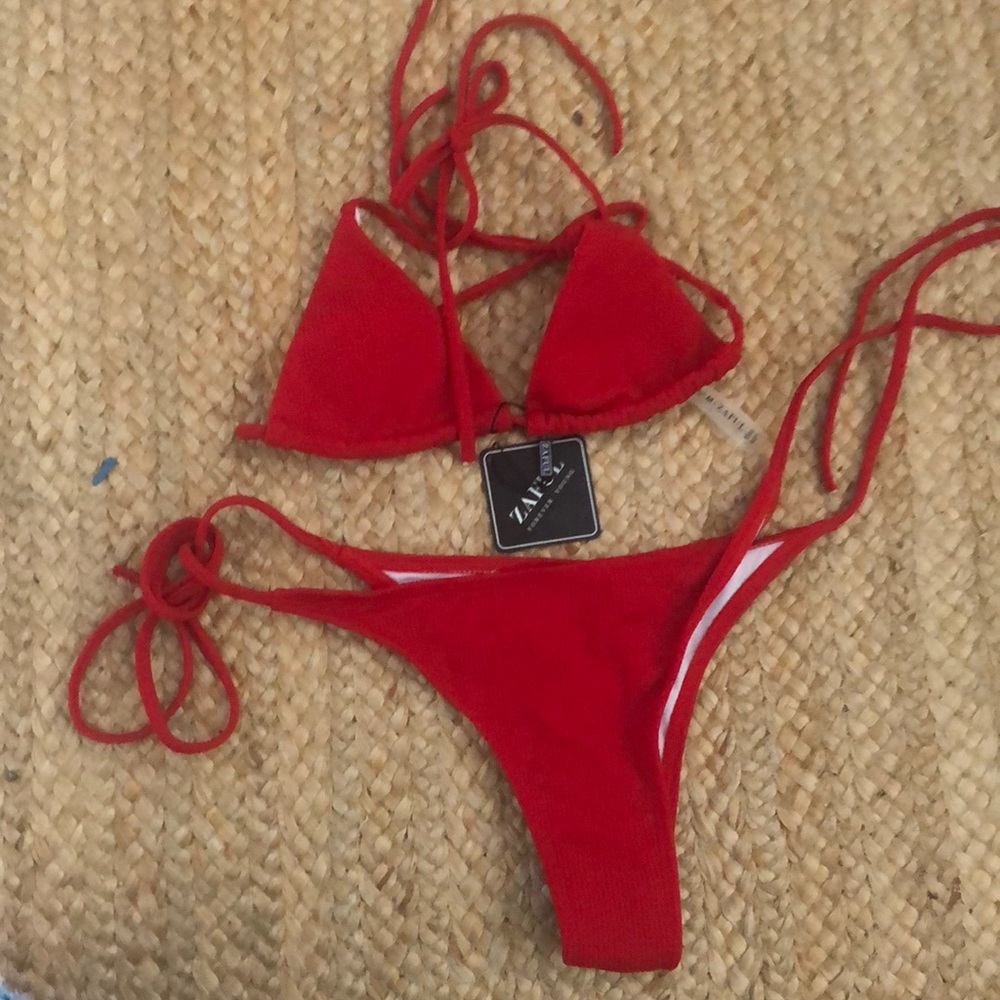 Little red bikini.  Never worn. Still has hygiene protector.